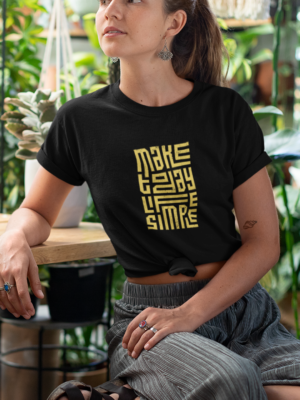 knotted-tee-mockup-featuring-a-relaxed-woman-in-a-greenhouse-27087