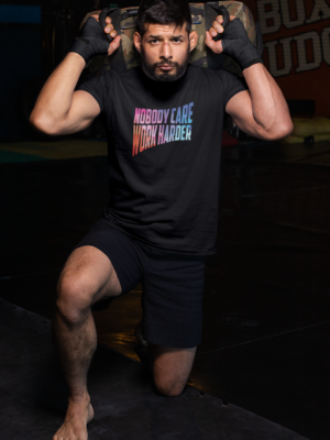 t-shirt-mockup-of-an-mma-fighter-kneeling-at-a-boxing-gym-26252