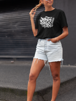 unisex-t-shirt-mockup-of-a-stylish-woman-in-the-street-22790